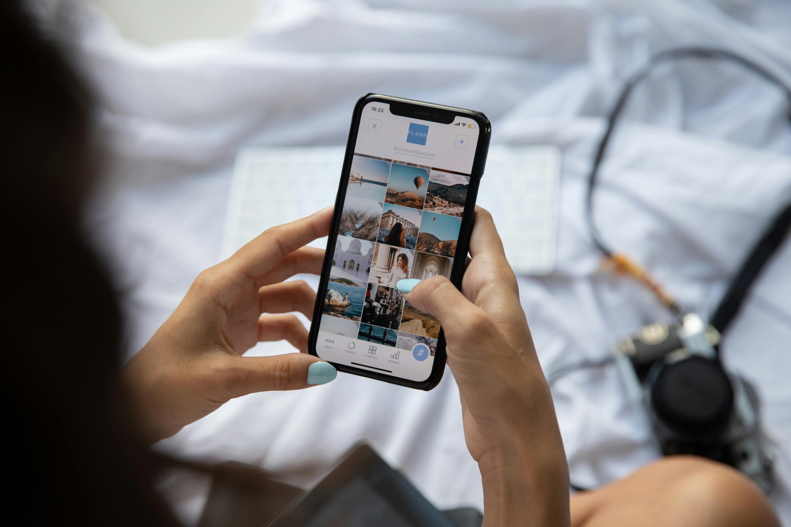 Woman holding a cellphone using social media